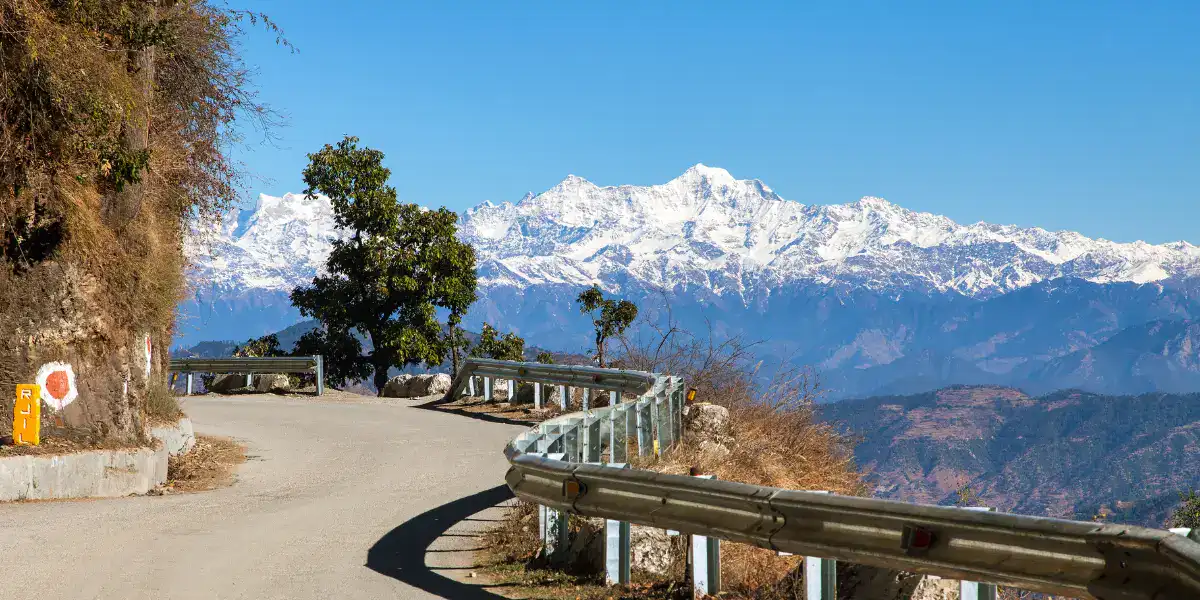Snowy Himalayan peaks seen from a Mussoorie viewpoint
