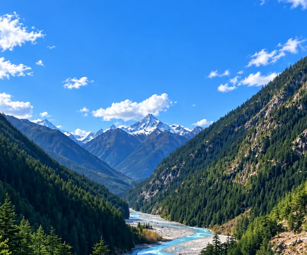 Helicopter flying through a mountain valley