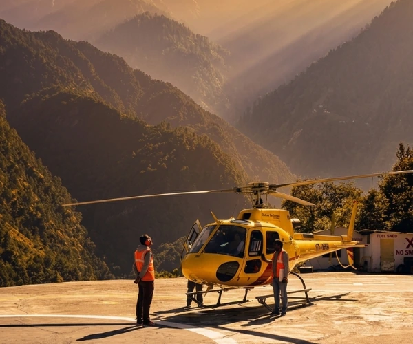 Helicopter in a green Himalayan valley